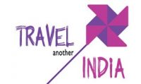 Image is a pink and purple pinwheel with the words Travel another India